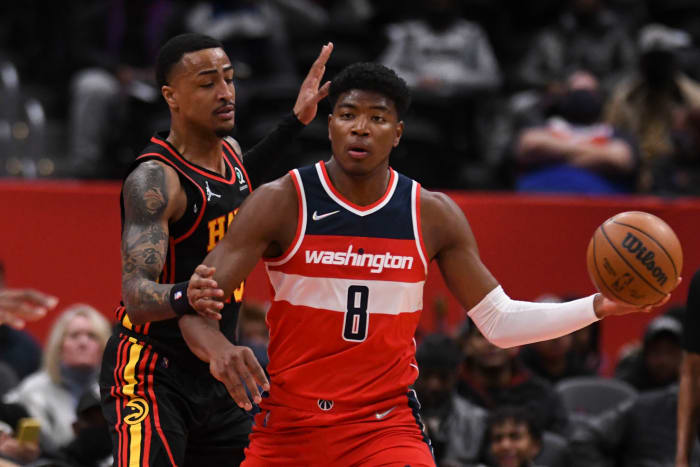 Atlanta Hawks forward John Collins guards Washington Wizards forward Rui Hachimura.